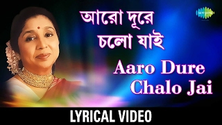 Aaro Dure Chalo Jai  আরও দূরে চাল যাই  Asha Bhosle  Lyrical Video [upl. by Nosmirc970]