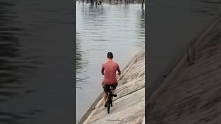 Danger cycling next to the river edges  Part 62 shorts trending viral [upl. by Icyaj]