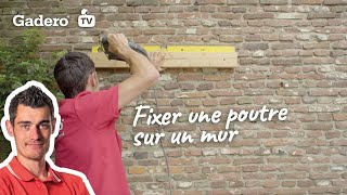 Fixer une poutre sur un mur [upl. by Ydniw253]