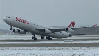 Swiss Airbus A340 extremely close amp heavy takeoff at Zurich Airport  snowy weather [upl. by Nylidam]