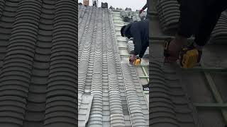 Installation process of conjoined tiles on cement structure roof [upl. by Ecirehs]