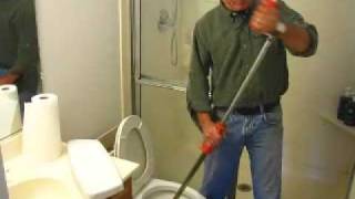 How to Clear a Toilet Clog using a Closet Auger [upl. by Airamasor106]