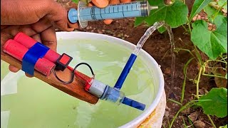 How to make mini water pump with mini DC motor a syringe [upl. by Eednil]