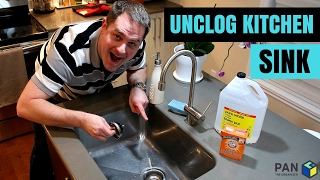 How to unclog a kitchen sink using baking soda and vinegar [upl. by Mundt]