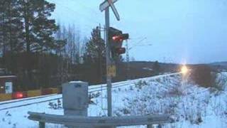 Express Train 705 going over Lamminkäyrä level crossing [upl. by Thorman]