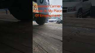 Common Carrier Truck Driver Nearly Drives Dump Truck Off Trailer [upl. by Ahseila852]