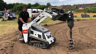 Bobcat MT55 with Augear how to drill a hole pcrsol [upl. by Haines]