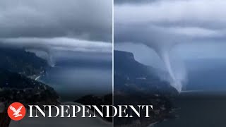 Spectacular water spout spins off Amalfi coast [upl. by Nimajnab]