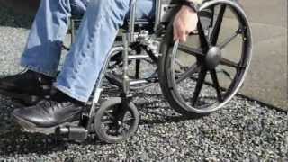 Wheelchair on CORE gravel driveway using 12 mm fractured rock [upl. by Siradal]