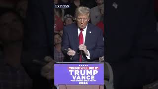 This mic STINKS Donald Trump rips mic from stand during rally [upl. by Nayar694]