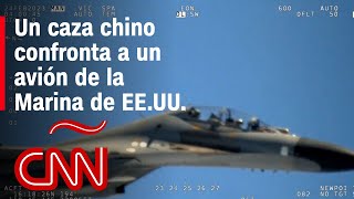 Un caza chino confronta a un avión de la Marina de EEUU [upl. by Roxane]