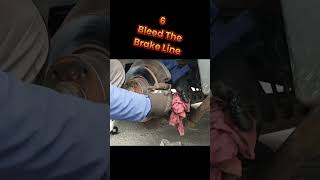 Brake Caliper Replacement Part 2 nissan mechanic garage brakecaliper shorts short [upl. by Oileduab180]