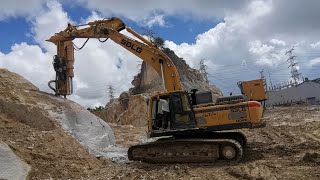 Rock drill and splitter attachments mounted on excavators [upl. by Neirol]