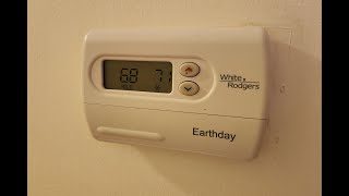 How to replace batteries White Rodgers Earthday Thermostat for home Furnace Air Conditioning [upl. by Myrtle]