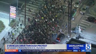 No arrests after 2 vehicles drove through crowd of protesters in Hollywood LAPD says [upl. by Torey]