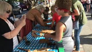 Visitors play pioneer games during Folklife Festival [upl. by Bowden579]