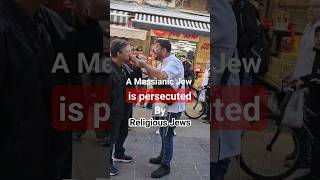 A Messianic Jew is persecuted by religious Jews while preaching the gospel Jerusalemwarisrael [upl. by Annoled]