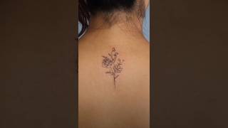 Flower tattoo on back short tattooideas artist [upl. by Yelrahc]