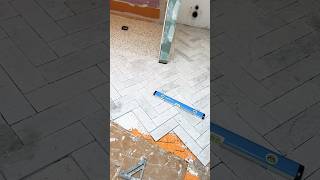 Herringbone tile installation [upl. by Faden435]