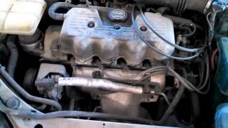 Engine ticking noise Ford Escort 20L loose spark plug [upl. by Gaughan]