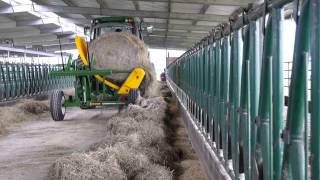 Hustler Bale Feeder Chainless 4000 feeding indoors [upl. by Konikow888]