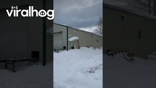 Building Roof Sheds Wet Snow  ViralHog [upl. by Leafar]