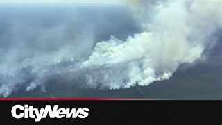 Wildfire prompts worker evacuation in Alberta [upl. by Kiley]