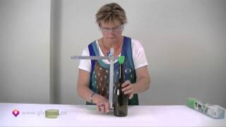 Glass Bottle Cutter  How to cut glass bottles Part 1 [upl. by Nepets]