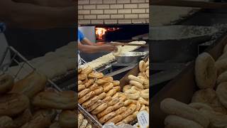 Montreal Bagels at StViateur Bagel Shop Montreal Quebec Canada [upl. by Orgell]