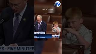 Congressmans son pulls silly faces during dads speech on House floor [upl. by Hands]