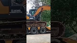 Excavator loading unto trailer [upl. by Gonick]