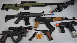 Realistic Toy Guns Airsoft Collection  AK47  M4  AWP Sniper Rifle  Shell ejecting Luger P08 [upl. by Anilehs446]