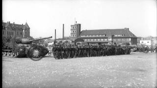 German troops from 512th Heavy Tank Destroyer Battalion surrender at Town Square HD Stock Footage [upl. by Noivert855]