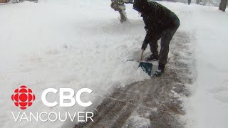 Snow Angel helps shovel snowy Vancouver streets [upl. by Atnoled794]