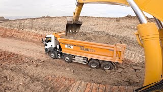 Komatsu Excavator loading sand in two directions [upl. by Koziel]