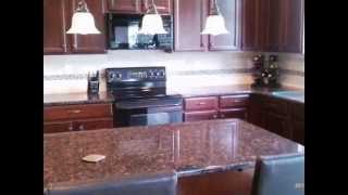 TAN BROWN GRANITEDark WoodHalf bullnose6040 Sink Concord NC 4 25 12 [upl. by Huston]