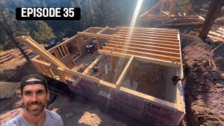 Building a Log Cabin Installing floor joists and Main Log Beam [upl. by Daus]