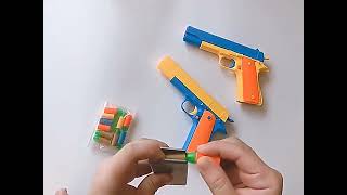 JY M1911 Kids Toy Gun Shooting Rubber Bullets [upl. by Kremer]