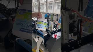 Semiautomatic round bottle labeling machine [upl. by Honig]