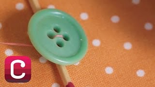 How to Sew a Button with Liesl Gibson  Creativebug [upl. by Nilla335]