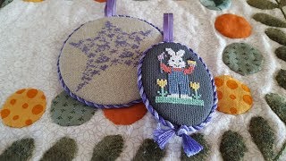 How to finish a cross stitch pieces into a round or oval ornament [upl. by Atnohs982]