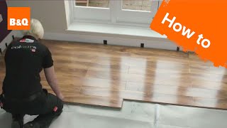 How to lay flooring part 3 laying locking laminate [upl. by Aenotna]