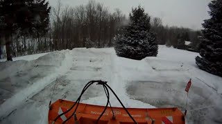 Bobcat S185 plowing snow on long concrete driveway [upl. by Margi694]