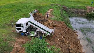 Start operation project Filling up land huge Bulldozer KOMATSU D37 Push Soil amp Stone Into Water [upl. by Kcirrag]