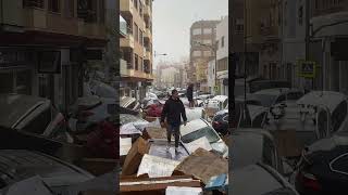 Valencia Flood Aftermath with Streets Piled with Debris and Submerged Cars [upl. by Imhsar956]