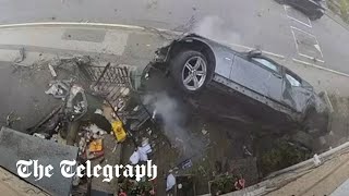 Speeding car smashes into houses and flips before occupants flea [upl. by Ettenhoj]