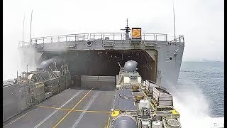 US Navy Landing Craft enters Well Deck of Japanese Ship [upl. by Nauqas]