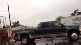 Ford F450 pulls Firetruck out of hole during Hurricane [upl. by Abel599]