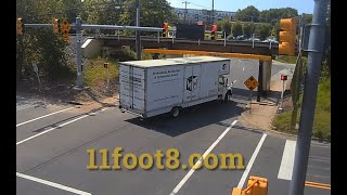 Moving truck hits 11foot88 bridge and leaves presents for bystanders [upl. by Dett23]