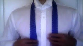 How to tie a tie  Quick and Easy [upl. by Namyw]